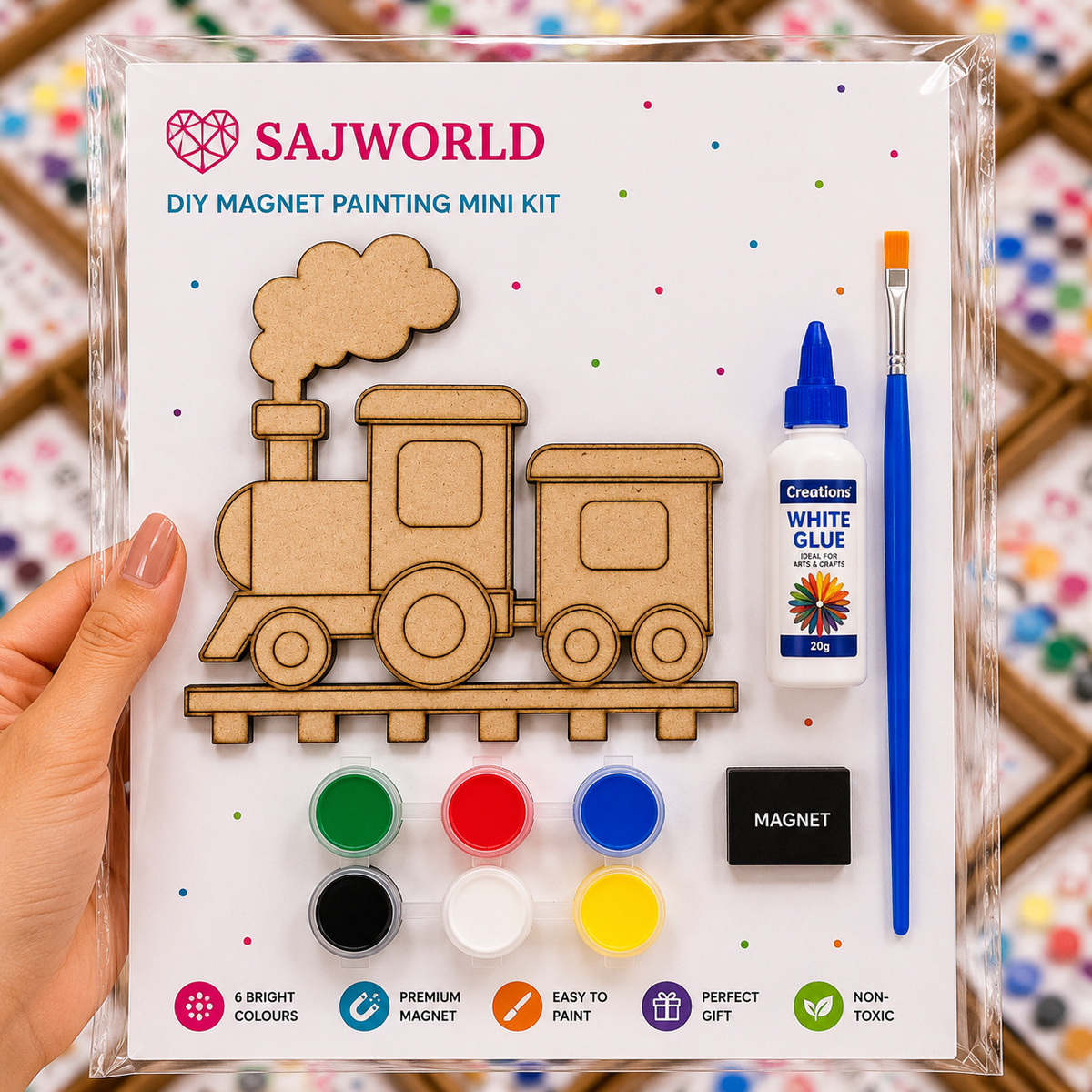 SajWorld train DIY magnet painting mini kit with MDF wooden train cutout, six paint colours, brush, glue and magnet for kids' creative craft activities.